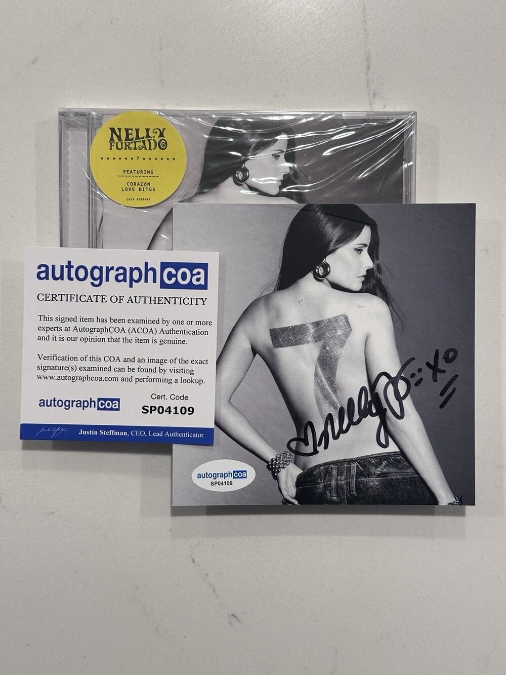 Nelly Furtado Signed - 7 CD + Signed Art Card (Love Bites) AUTOGRAPHED COA #1